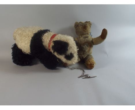 A Vintage Teddy Bear and Panda Bear Soft Toy