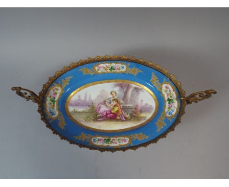 A 19th Century Sevres Style Ormolu Mounted Two Handled Oval Bowl on Four Scrolled Feet Decorated with Gent Playing Musical In