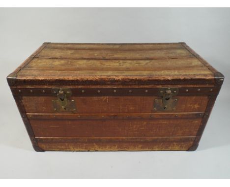 A Moynat Travelling Trunk, Canvas Covered with Wooden, Leather and Brass Mounts. Inner Paper Label. Leather Carrying Handles 