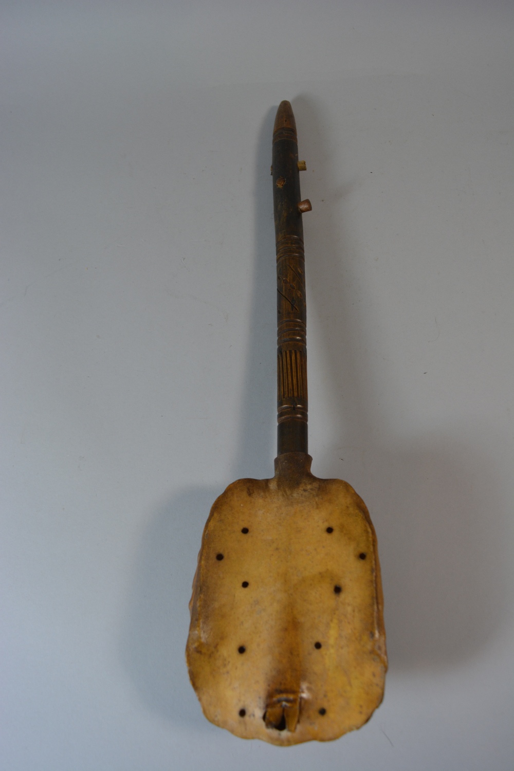 An African Two Stringed Musical Instrument Made from Leather Covered ...