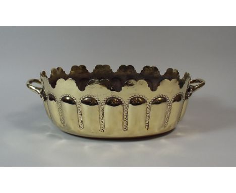 A Late Victorian Oval Brass Planter with Embossed Floral Decoration to Body and Claw and Ball Feet. Lion Mask Ring Carrying H