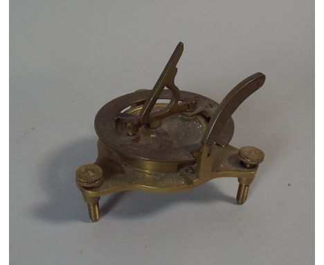A Reproduction Brass Sundial/Compass Inscribed with Pseudo Mark for F.L. West. 