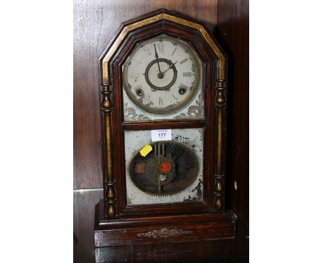 A PAINTED OAK MANTLE CLOCK