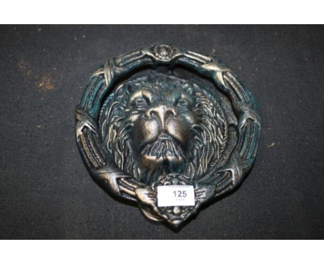 *A CAST LION HEAD DOOR KNOCKER*