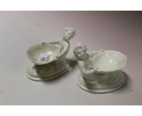 A PAIR OF EARLY ROYAL WORCESTER MERMAID CREAMWARE DISHES 