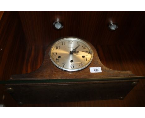 A WIDEX NAPOLEON HAT MANTLE CLOCK