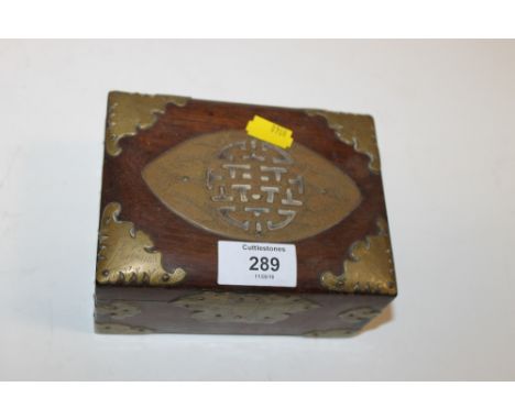 A BRASS BOUND MAHOGANY CASKET SHAPED TRINKET BOX