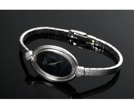 Feine Weißgold 750 Chopard Damen Armbanduhr mit ovalem schwarzem Zifferblatt und Brillanten (zus. ca. 0.30ct/VSI-SI/W), Handa