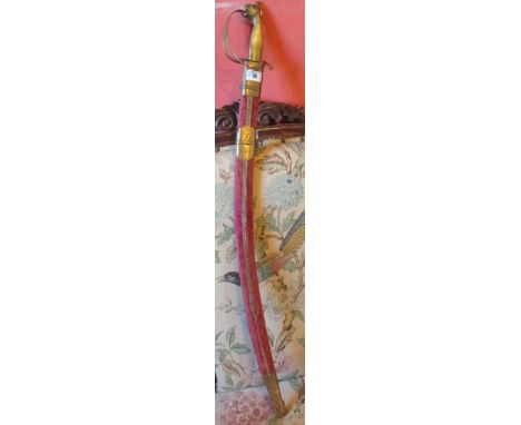 An Indian Calvary Brass Mounted Sword, with a plush mounted scabbard, 98cm.