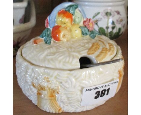 A Clarice Cliff Relief Moulded Preserve Pot & Cover.