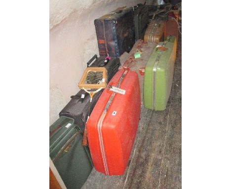A Large Collection of Suitcases, to include four Samsonite, an old canvas covered leather trunk, etc.