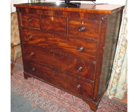 A Victorian Mahogany Chest of Drawers, two short over three long, standing on bracket feet. 124cm wide.