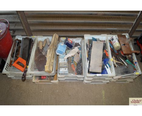 Eleven trays of various tools to include hand saw, glue gun etc.