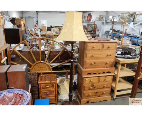 A mahogany standard lamp and various shades 