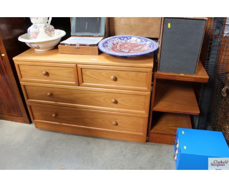 A G-plan chest fitted two short over two long drawers; and a three tier corner shelf