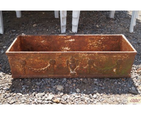 A cast iron planter 