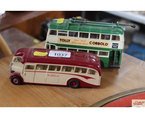 A Corgi model of a Leyland coach; and a Corgi model of a trolley bus
