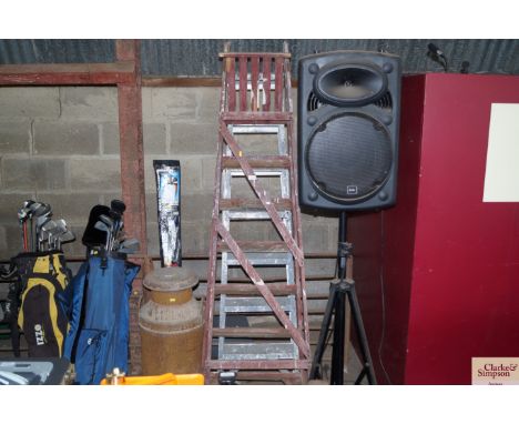 A wooden step ladder together with a metal step ladder