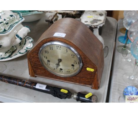 A W Hinds Ltd oak cased three hole mantel clock
