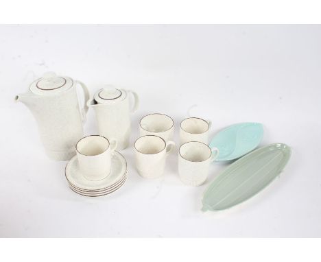 Poole Pottery coffee service, consisting of four cups and saucers, a coffee pot, water pot, and a sugar bow, together with a 