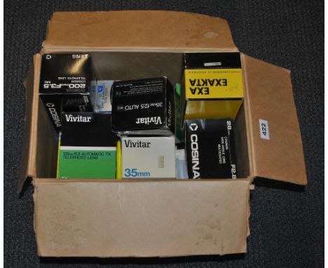 A quantity of mixed camera lenses.