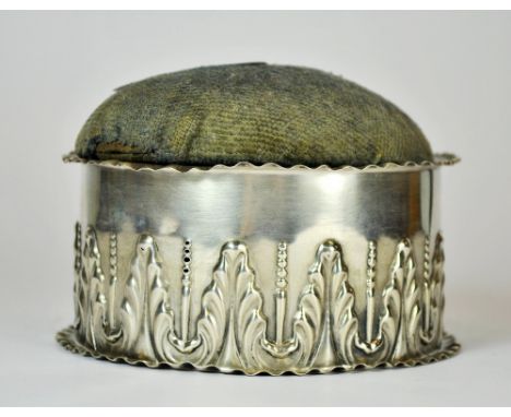 A hallmarked silver pin cushion box, Dia. 10cm, H. 7cm. Chester, makers mark S.I.D.