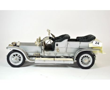 A large Franklin Mint 1/12 scale die cast model of a Rolls Royce Silver Ghost with box, L. 41cm.