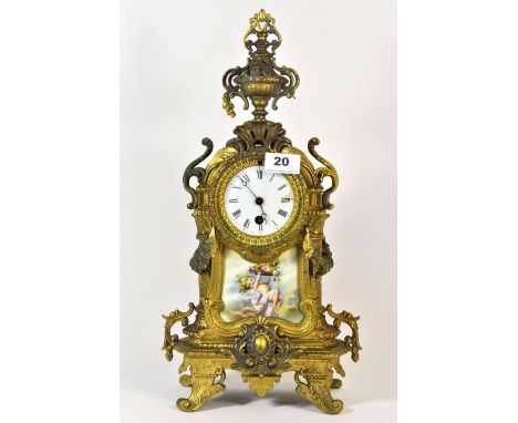 A 19th century French gilt spelter and porcelain mantle clock, H. 45cm.