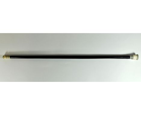 A 19th century rosewood and turned ivory swagger stick, L. 69cm.