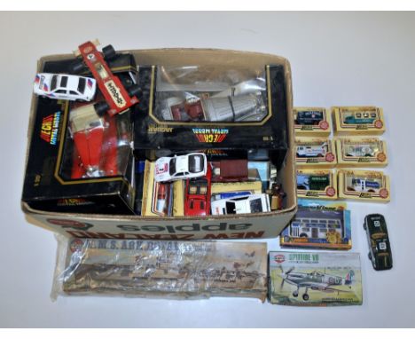 A quantity of die cast toy cars including 1/20 scale models and two Airfix kits.