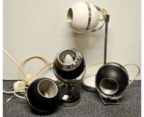 A quantity of vintage globe wall and desk lights.