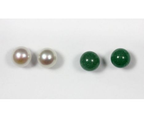 A pair of jade and silver earrings with a pair of cultured pearl and silver earrings.
