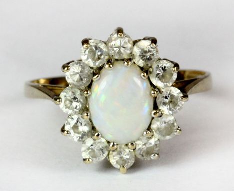 A 9ct gold opal and stone set cluster ring (N.5).