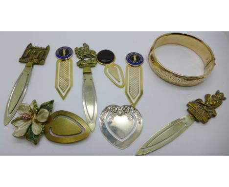 A 9ct gold metal core bangle and assorted bookmarks