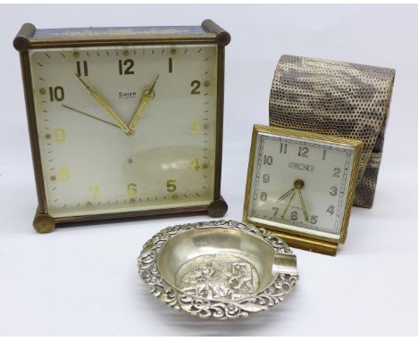A Swiza Mignon 8-days alarm clock, a Chronex travel alarm clock and a continental white metal ashtray