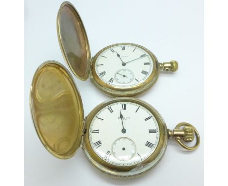 Two Elgin full hunter gold plated pocket watches, one lacking bow, all lacking glass and hands
