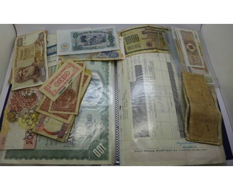 Banknotes and a folder of British and German share certificates