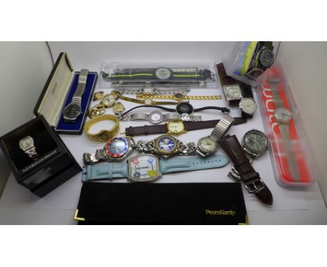 A collection of wristwatches including Timex, Rotary, Cannibal, and two Swatch, boxed