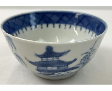 A Chinese ceramic blue &amp; white tea bowl with hand painted scenic decoration to outer bowl. Wide painted rim to inner bowl