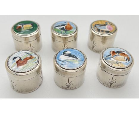 A set of 6 limited edition silver and enamel Peter Scott 'Wildfowl Trust' boxes, numbered 205 of 500. Each top decorated with