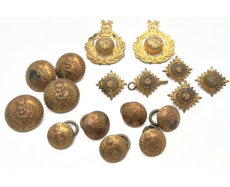 A collection of assorted vintage military badges and buttons. To include WWII Royal Army Medical Corps buttons, Officers pips