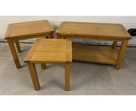 A modern light oak coffee table together with 2 matching side/lamp tables. Under shelf to coffee table. Largest approx. 45.5 