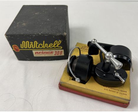 A boxed vintage Mitchell Prince 308 fishing reel with planamatic gears. Complete with extra spool and storage box. Mitchell n