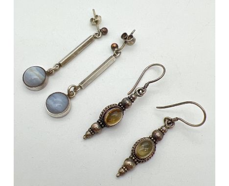 2 pairs of silver drop earrings. An ethnic style pair set with round citrine cabochons and a pair set with round cut lace aga