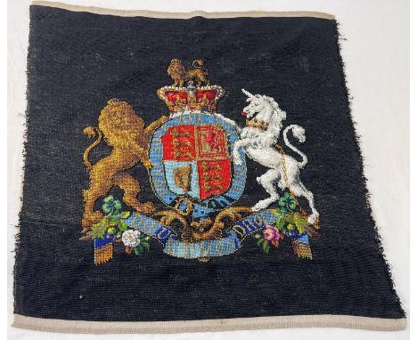 A vintage piece of needlepoint depicting the Arms of Dominion Royal Coat of Arms. Fabric approx. 54cm x 54cm. 