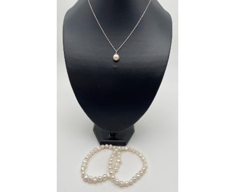 2 freshwater white pearl stretch bracelets together with a silver 18" chain with round faux pearl pendant. Silver marks to ch