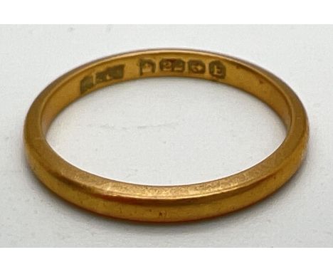 A vintage 22ct gold 2mm wedding band. Full hallmarks to inside of band. Size HÂ½. Total weight approx. 1.9g. 