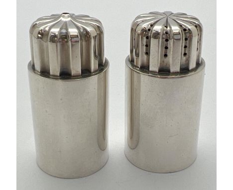 Georg Jensen silver salt and pepper designed by Sigvard Bernadotte, numbered design 834. Of cylindrical form and with channel
