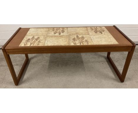 A retro 1970's teak tile topped coffee table with beige wheat design tiles, by Sunelm. Approx. 42 x 105 x 45.5cm. 