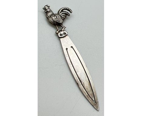 An Art Deco silver bookmark with cockerel shaped finial, hallmarked Glasgow 1929 and with W H Collins &amp; Co makers mark. A